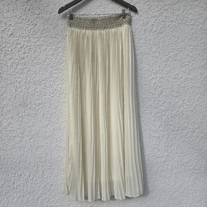 Elegant Cream Pleated Skirt.